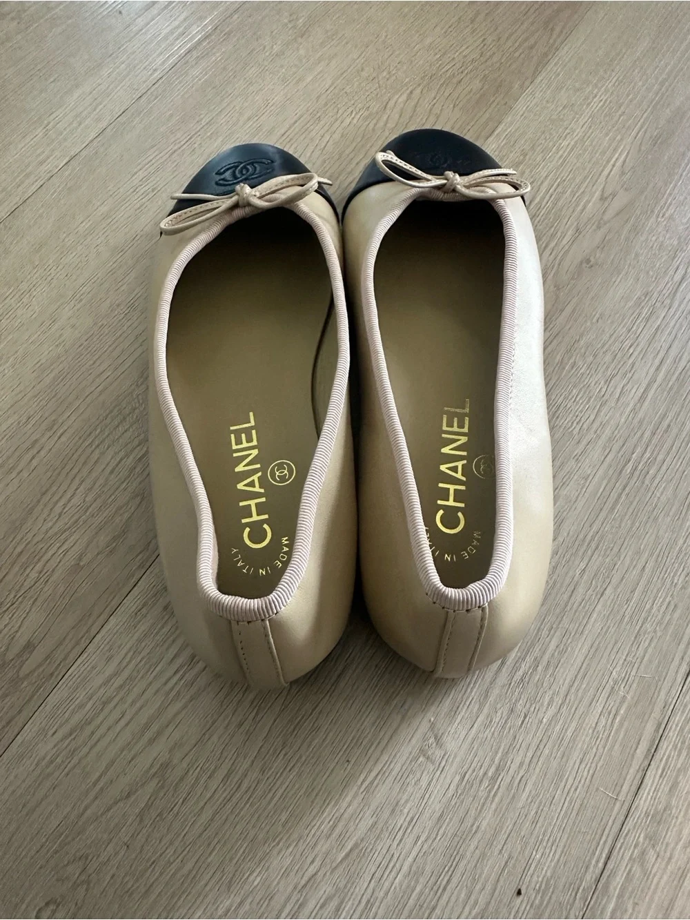 CHANEL Beige Leather Ballet Flats with Black Cap Toe